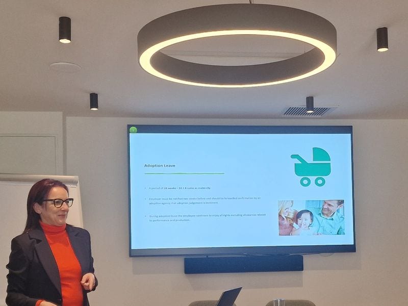 Alexia presenting on adoption leave